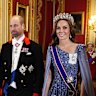 The Prince and Princess of Wales arrive for the state banquet at Windsor Castle on Wednesday.