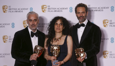 Australia’s Emile Sherman (right) with fellow producers Iain Canning and Tanya Seghatchian with the best film award for The Power of the Dog at the BAFTAS.