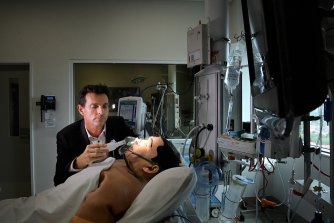 ANU Professor Frank van Haren simulates administering inhaled heparin.