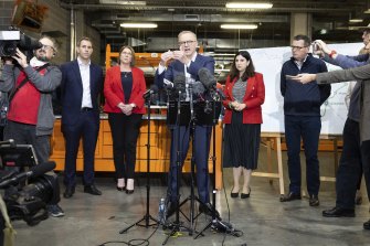 Opposition Leader Anthony Albanese addresses the media in Box Hill on Tuesday. He was joined by Victorian premier Daniel Andrews (right) and Labor’s candidate for Chisholm Carina Garland (in red jacket on right).