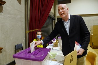 Liberal candidate Trent Zimmerman casts his vote in the North Sydney electorate at Willoughby Public School.