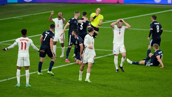 England’s Declan Rice (white shirt, right) reacts after missing a chance during the clash with Scotland.