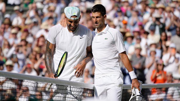 Kyrgios and Djokovic share a moment.