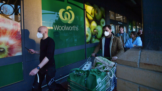 Some Woolworths customers will be able to book a shopping time slot online to avoid waiting outside. 