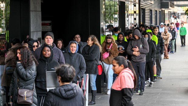 Applicants queued up for at least three hours in Melbourne on Monday to check on the status of their passports.
