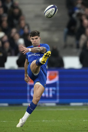 France’s Matthieu Jalibert clears the ball  against Australia.