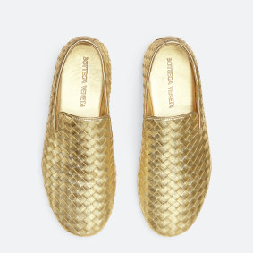 Marie du Petit Thouars is enjoying her gold Bottega Veneta “Sunday” slippers.