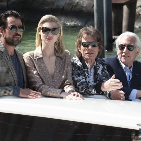 The stars arrive at the Venice Film Festival photocall, from left, Claes Bang, Elizabeth Debicki, Mick Jagger, Donald Sutherland.