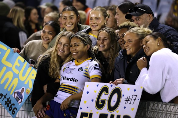 Fleur Ginn with family and friends after the win over Cronulla.
