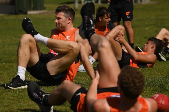 Giants captain Toby Greene stretches at training. 