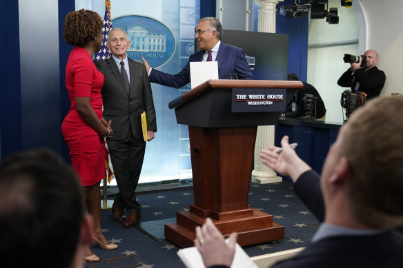 Dr Anthony Fauci departs after speaking alongside White House press secretary Karine Jean-Pierre, left, and White House COVID-19 Response Coordinator Ashish Jha at the White House.