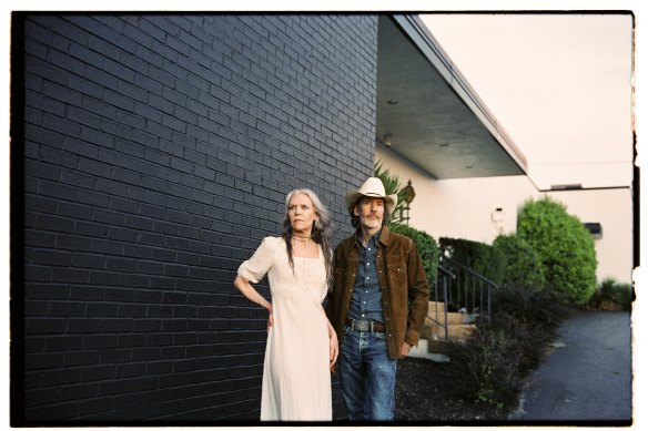 Gillian Welch and David Rawlings outside their tornado-struck studio.