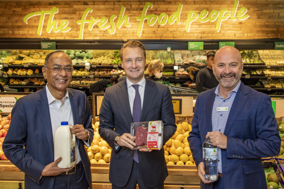 Pact Group chief Sanjay Dayal, NSW environment minister James Griffin and Woolworths executive Rob McCartney with items that could now be packaged with recycled plastic. 