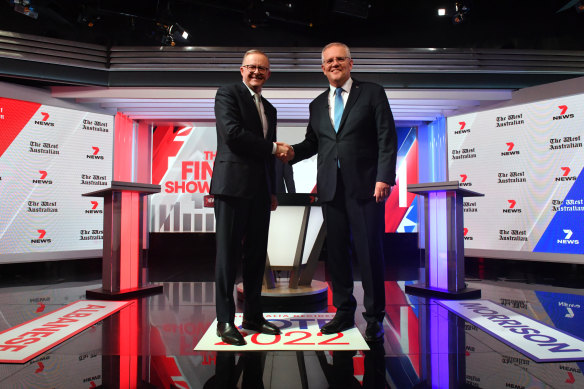 Prime Minister Scott Morrison and Opposition Leader Anthony Albanese shake hands as the debate gets under way on Wednesday evening.