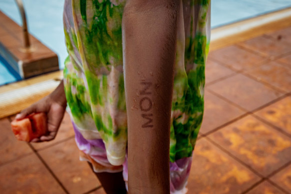 Stamp of approval: With proof of attendance, this child can dive in.