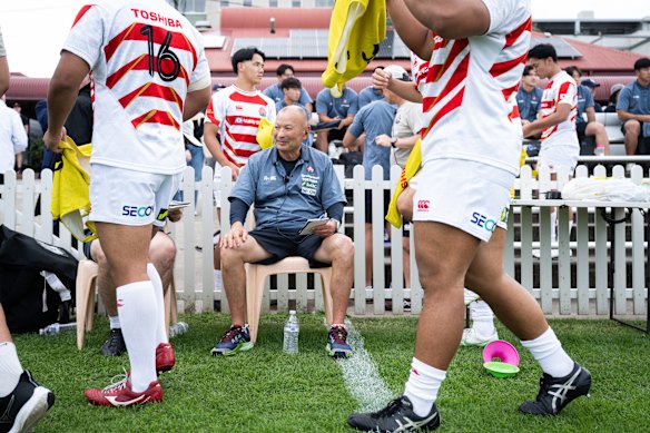 Eddie Jones looks on as Japan’s under-23s side warm up for a clash with Randwick. 