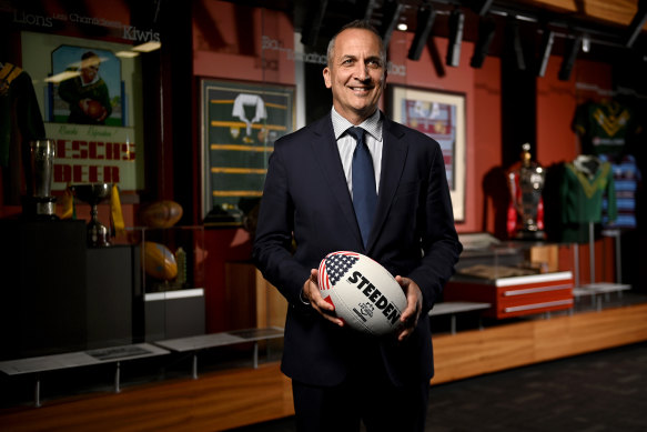 NRL chief executive Andrew Abdo poses with an American-themed football ahead of the historic season-opening games in Las Vegas. 