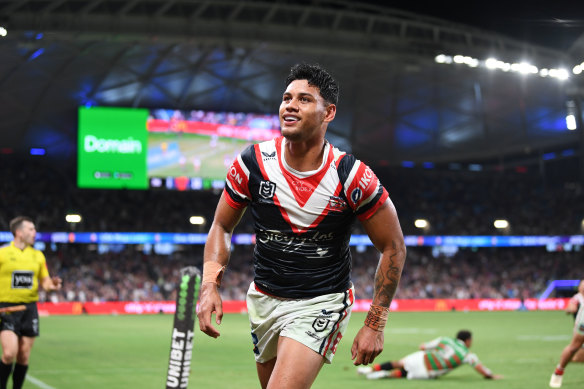 Jaxson Paulo celebrates a try for the Roosters.