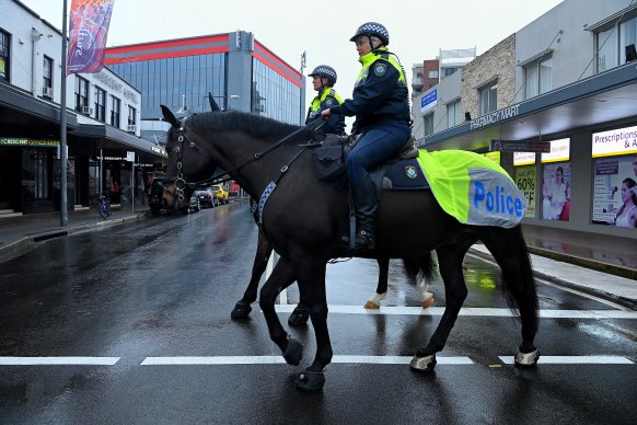 Mounted police patrol the streets of Fairfield during Sydney’s 2021 COVID-19 lockdown.