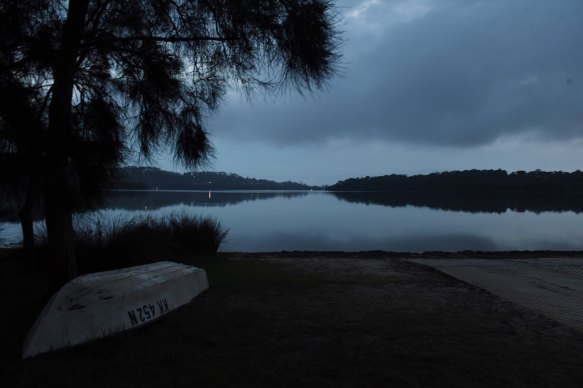 A grey dawn over Narrabeen Lakes on Monday.