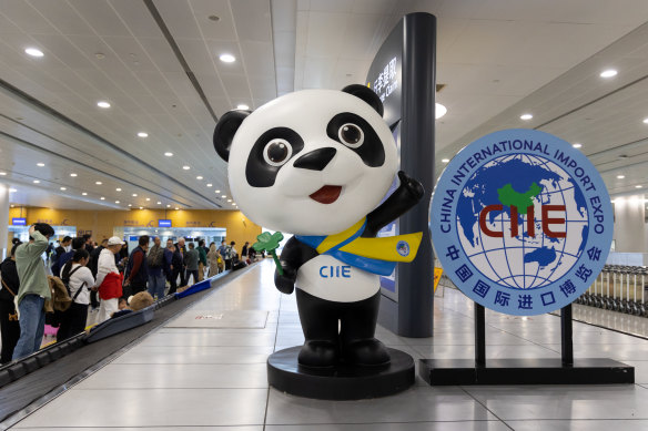 The “Jinbao” giant panda mascot welcomes visitors at Shanghai Pudong International Airport. 