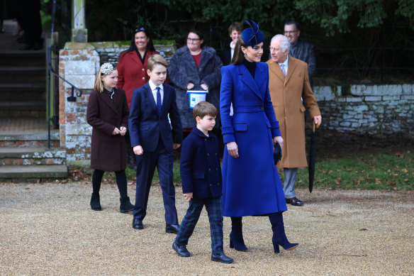 The Duchess of Cambridge with her son, Louis, following the Christmas Day church service at Sandringham. 
