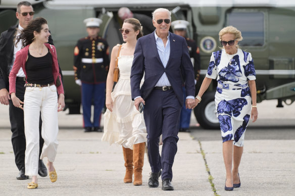 President Joe Biden and first lady Jill Biden on Saturday with granddaughters (from left) Natalie and Finnegan Biden. 