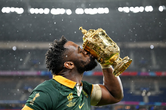 South Africa captain Siya Kolisi kisses the Webb Ellis Cup after leading his team to their second consecutive Rugby World Cup final victory.