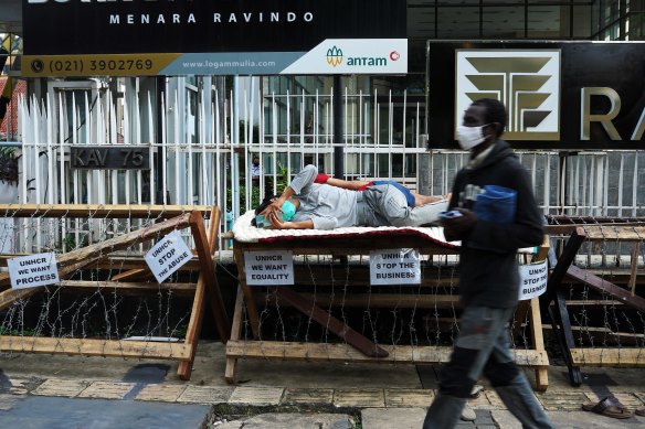 Refugees in Indonesia protest outside the UNHCR headquarters in Jakarta in May.