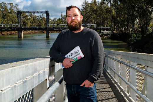 Bridge back to life: The Bridge newspaper owner Lloyd Polkinghorne beside the Murray River at Barham.