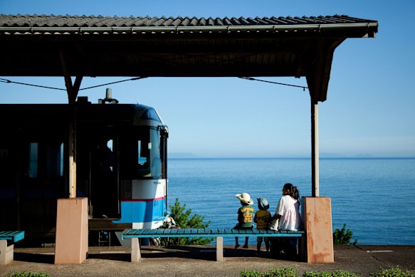 Waiting for a train at Japan’s Shimonada station, which overlooks the calm waters of the Seto Inland Sea.