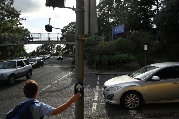 The council says the school must comply with the original conditions of  planning approval for its expansion plans. 