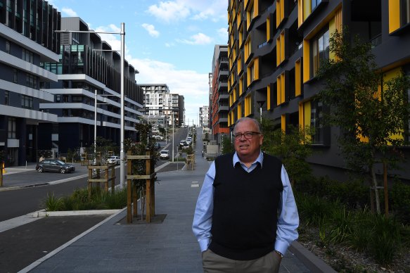 Cop on the beat: NSW Building Commissioner David Chandler outside newly built apartments.
