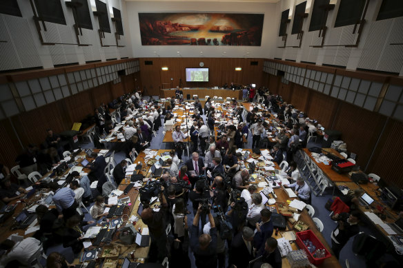 Politicians and media in the budget lock-up bubble in Canberra.