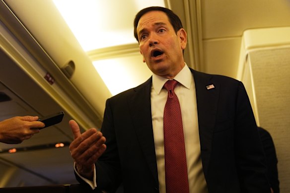 US Secretary of State Marco Rubio speaks to reporters on board his plane at Jaipur International Airport.