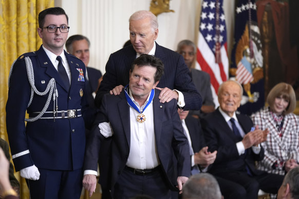 Actor Michael J. Fox receives his award. 