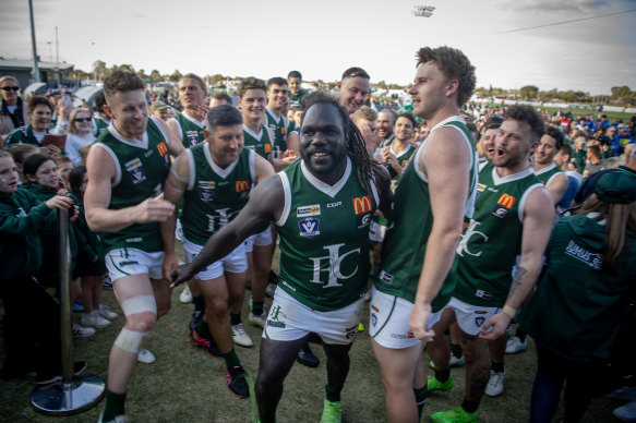 Anthony McDonald-Tipungwuti celebrates Imperials’ premiership in Mildura on Saturday.