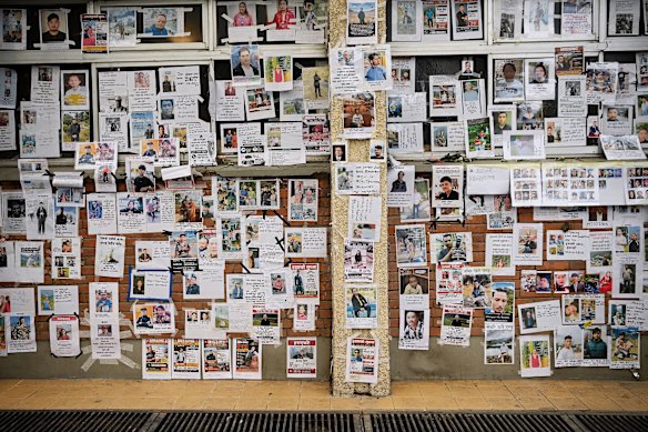 A wall at Tribhuvan University Teaching Hospital in Kathmandu where people post images of people missing after the floods.