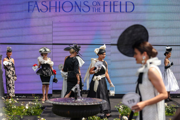 Contestants in the Fashions on the Field competition on Derby Day at Flemington racecourse.