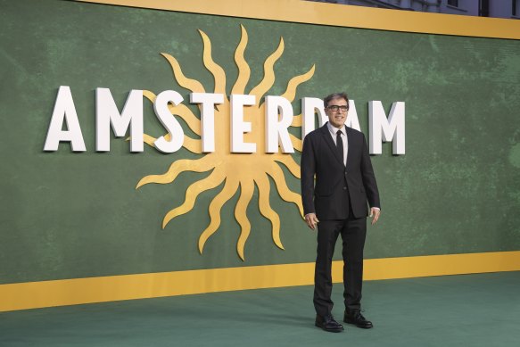 Director David O. Russell poses for photographers at the Amsterdam world premiere. Russell has a troubling history of on-set behaviour.