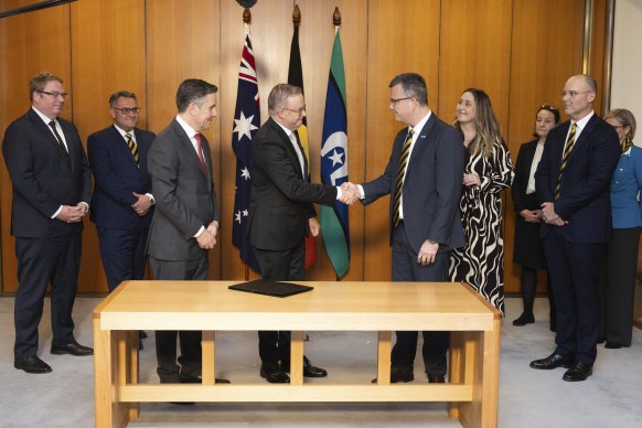 Butler (front left), Albanese and Twomey (front right) during the signing of the 8th community pharmacy agreement at Parliament House.