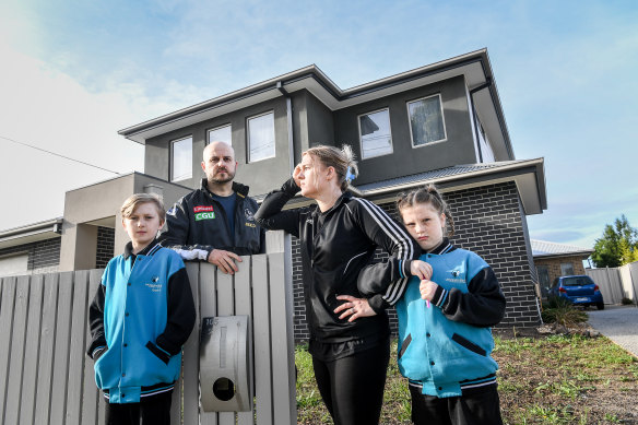 Arron Reid with wife Michelle Hodgers and two of their three children Kai and Payton. The young family live on Denton Avenue in St Albans.