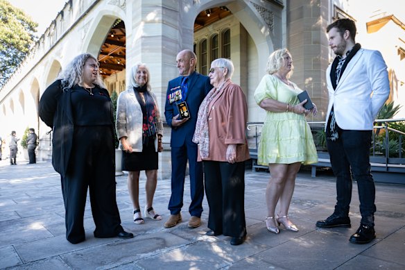 The families of two Australian military heroes at NSW Government House (left to right) Renee Everill, Phyllis Everill, George Wheatley, Edna Wheatley, Chantal Swanton-Gallant, and Nicholas Swanton-Gallant