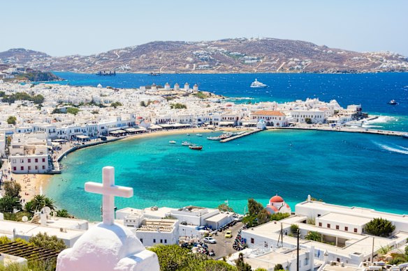 Mykonos town is a pretty Greek-island cliché of whitewashed cubic buildings and domed churches.