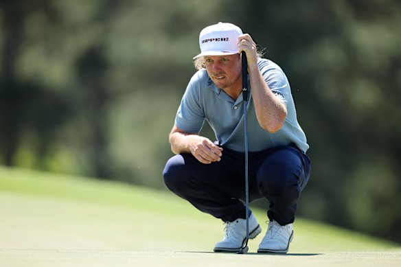 Australia's Cameron Smith tees off on the 18th green.