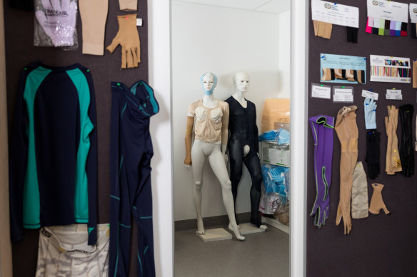 Examples of compression garments on display at the burns unit. These are made to fit each patient.