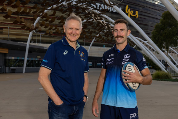 Wallabies coach Joe Schmidt with scrumhalf Nic White.