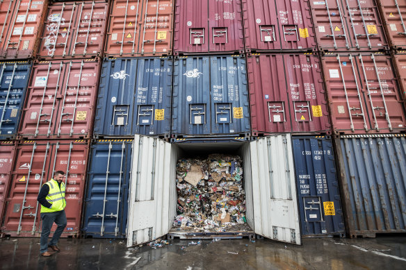 Going nowhere: Containers filled with waste from recycling business SKM in Brooklyn last month.