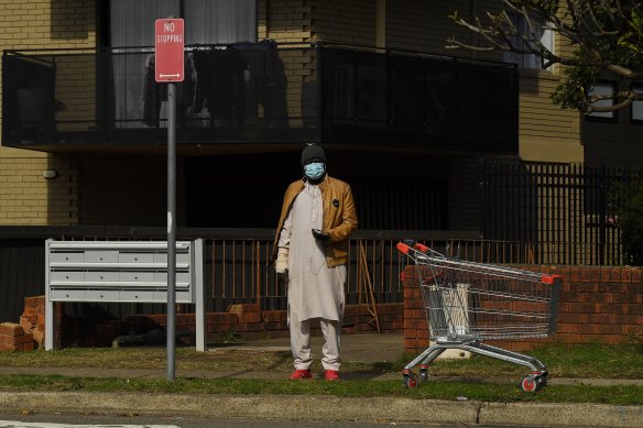 A man wearing a mask in Fairfield earlier this month. The local government area is one of eight where masks will be mandatory outside from tomorrow.