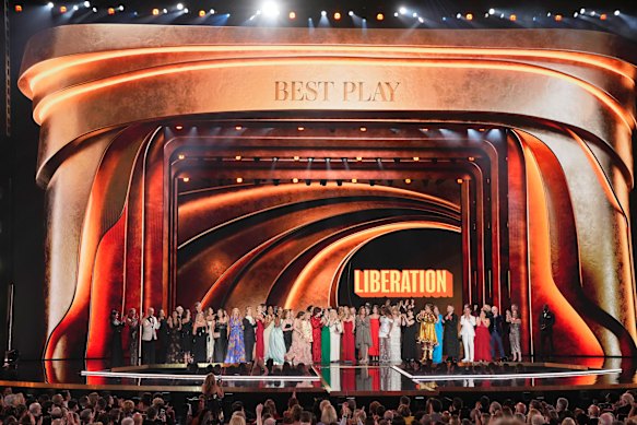 Bess Wohl, centre, and the cast and crew of Liberation accept the award for best play.